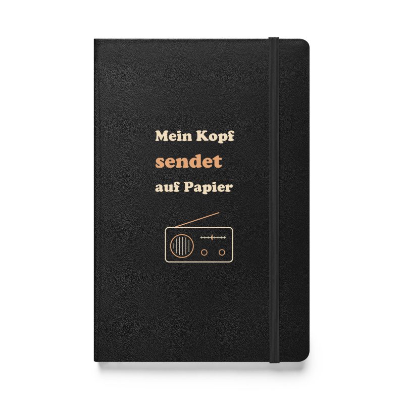 Schwarzes Hardcover-Notizbuch „Mein Kopf sendet auf Papier“ mit runder Creme-Apricot-Schrift und Radio