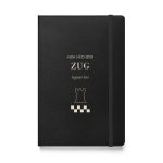 Schwarzes Hardcover-Notizbuch „Mein nächster Zug beginnt hier“ mit heller Schrift und goldenem Turmmotiv
