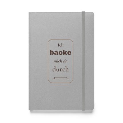 Silbernes Hardcover-Notizbuch „Ich backe mich da durch“ mit brauner Schrift, rundem Rahmen und Nudelholzmotiv – Vorderansicht