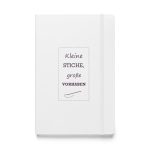 Weißes Hardcover-Notizbuch „Kleine Stiche, große Vorhaben“, Vorderseite
