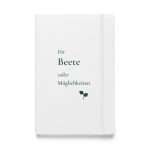 Weißes Hardcover-Notizbuch mit dunkelgrüner Schrift „Für Beete voller Möglichkeiten“ und Keimling – Vorderansicht